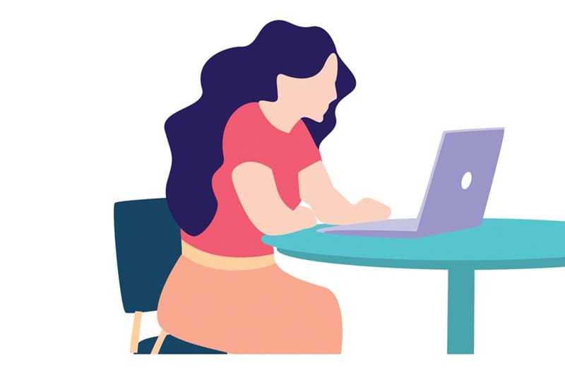 An illustration of a woman sitting at a round table working on her laptop. 